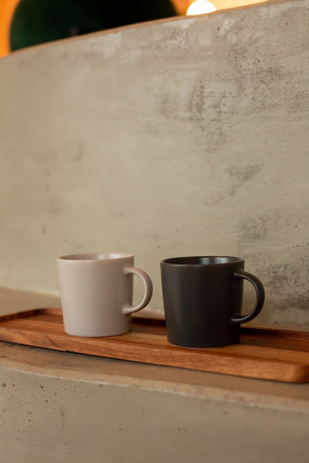 Two handmade mugs from the Terra and Tumble commerce example.